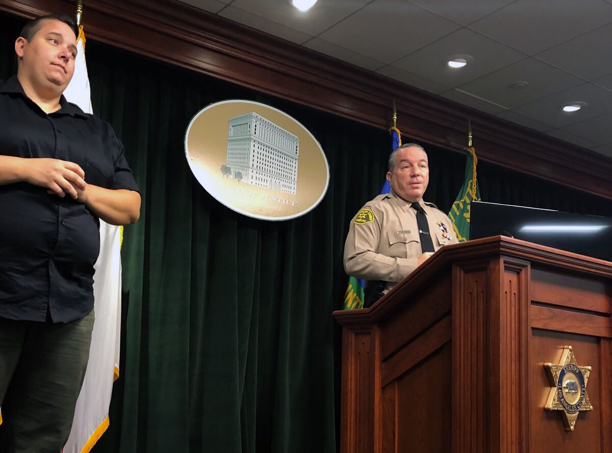 Los Angeles County Sheriff Alex Villanueva discusses an incident Wednesday, Aug. 12, 2020 where a deputy fatally shot 18-year-old Andres Guardado five times in the back. Authorities said Wednesday that the shooting occurred in an unincorporated area near the city of Gardena that has been the location of multiple crimes in recent years, including the June 7, 2020, attack. (AP Photo/Stefanie Dazio)