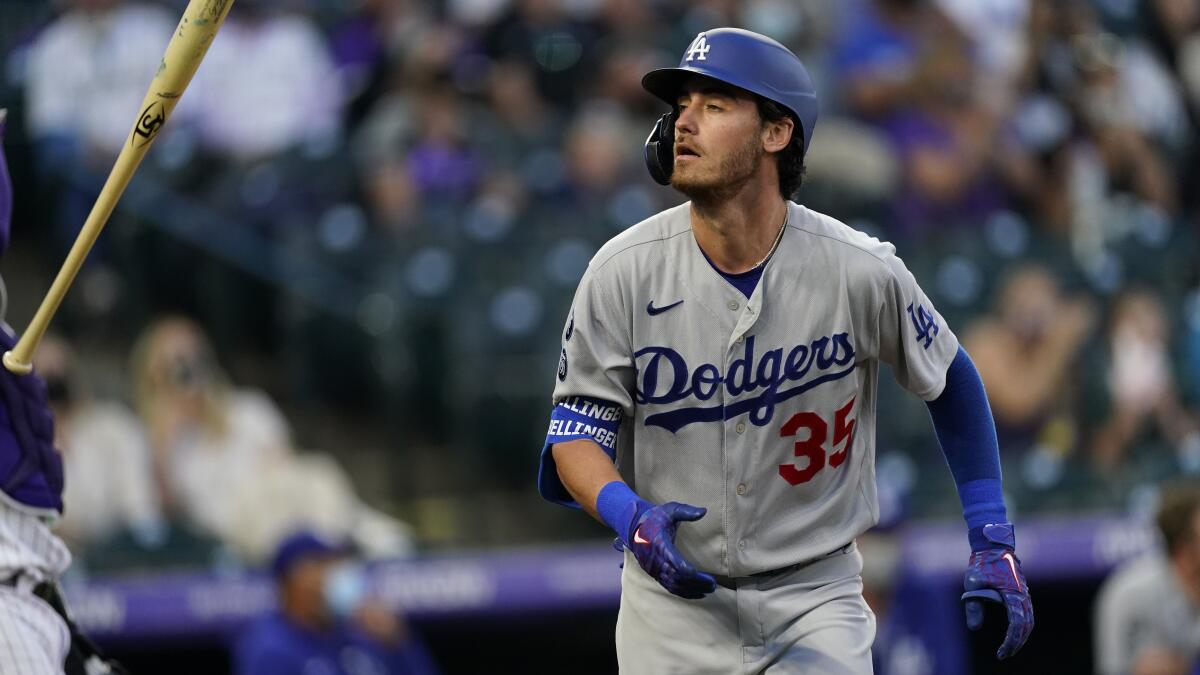 The Dodgers' Cody Bellinger tosses his bat during a game against the Colorado Rockies on April 4.