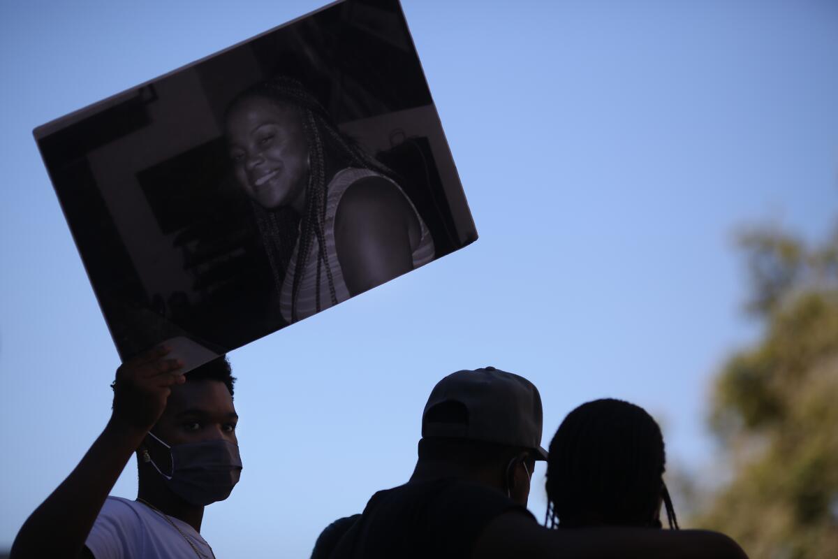 Wakiesha Wilson's family speaks on stage during a Black Lives Matter rally in Los Angeles in July 2020.