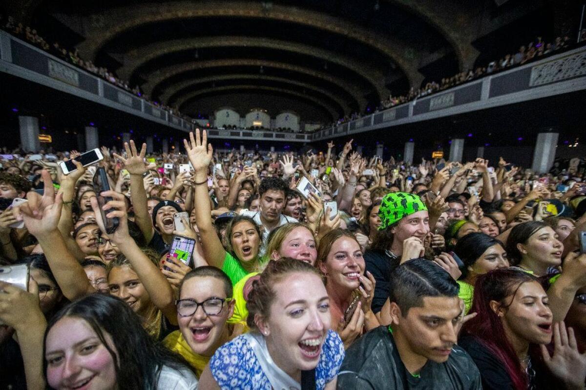 Fans cheer as Billie Eilish performs at the Shrine Auditorium in L.A. on July 9, 2019.