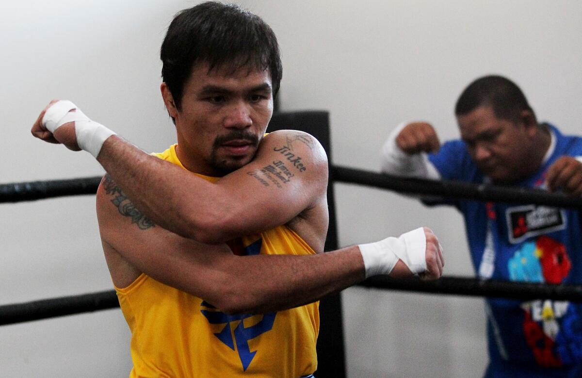 Manny Pacquiao opens training camp at the Wild Card Boxing Club in Hollywood on March 9.