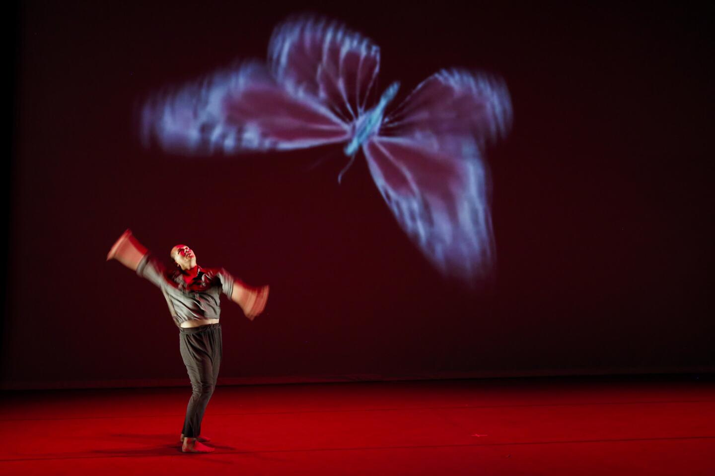 Nguyen Nguyen dances during a dress rehearsal of David Rousseve's latest dance-theater piece, "Stardust," at REDCAT.