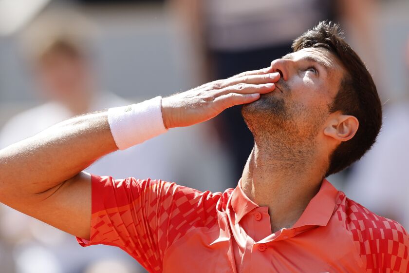 Serbia's Novak Djokovic celebrates after winning the first round match of the French Open