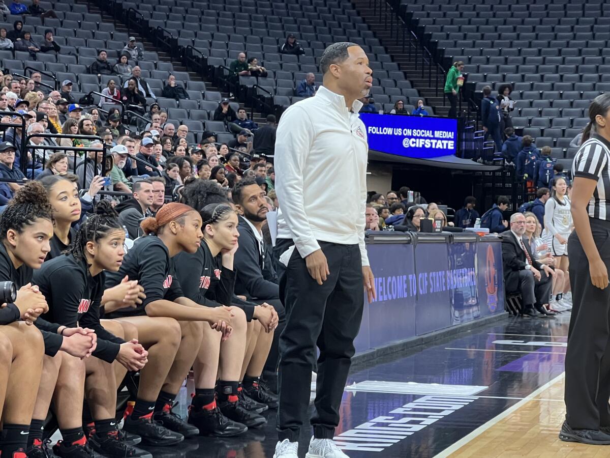Coach Stan Delus of Etiwanda watches the Eagles play in the state championship game at Golden 1 Center.