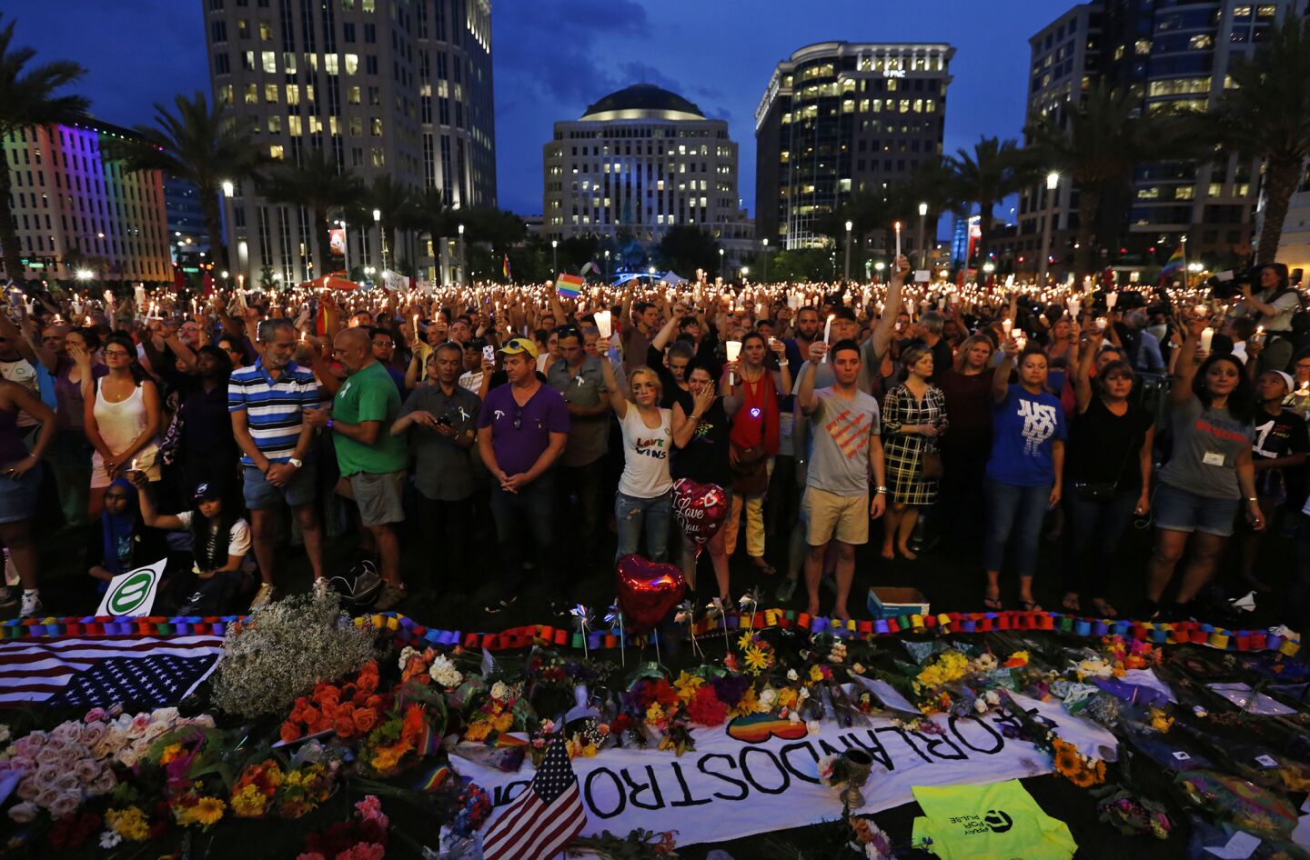 Thousands gather for a memorial at the Plaza at the Dr. Phillips Performing Arts Center in downtown Orlando on June 13, 2016, to honor those killed and wounded in the Pulse nightclub attack.