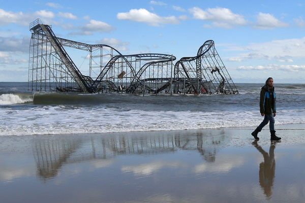 A roller-coaster that sat atop the Fun Town pier in Seaside Heights, N.J., rests in the ocean shortly after Superstorm Sandy.