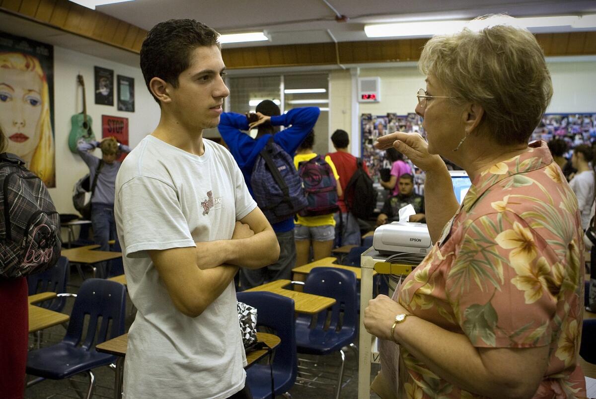 Steve Habba, 17, a senior at Valhalla High School in El Cajon, spoke with school counselor Elaine Swatniki, who held a class for seniors on how to plan for their post-secondary education