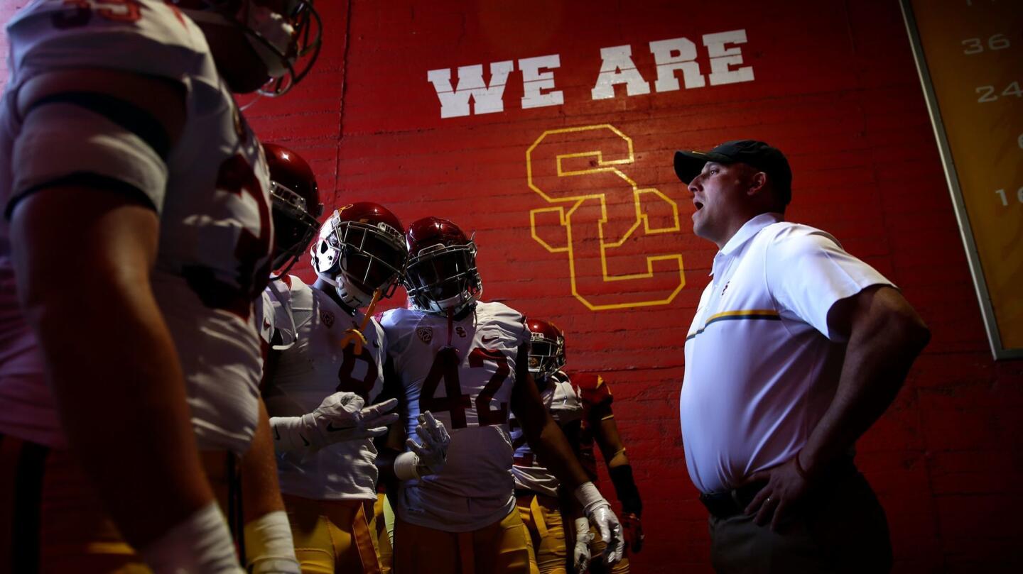 USC Coach Clay Helton prepares to lead the Trojans on to the field.