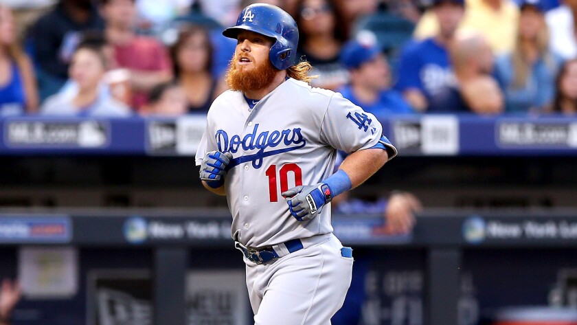 Dodgers infielder Justin Turner has missed two weeks of games because of an infection in his right thigh.