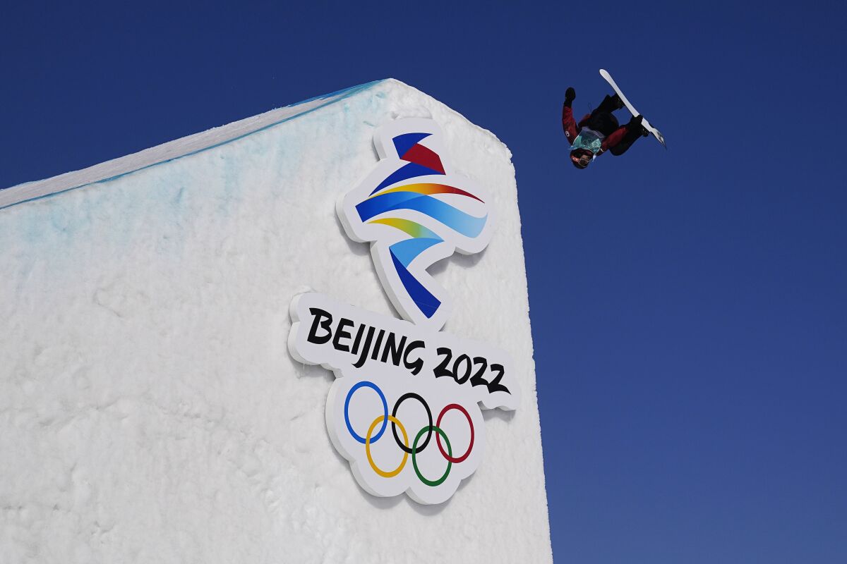 Mark Mcmorris of Canada competes during the men's snowboard big air qualifications of the 2022 Winter Olympics, Monday, Feb. 14, 2022, in Beijing. (AP Photo/Jae C. Hong)