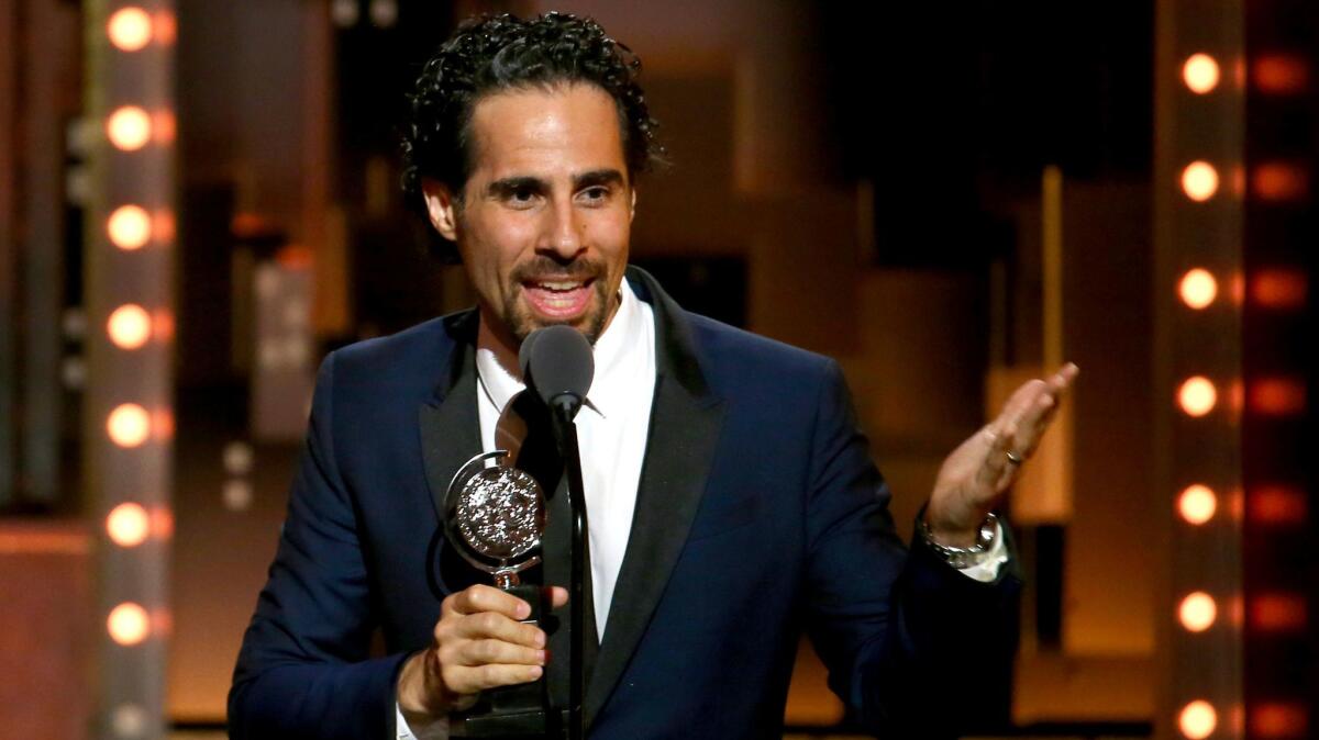 "Hamilton" music director Alex Lacamoire, photographed in June accepting his third Tony Award, this time for "Dear Evan Hansen."