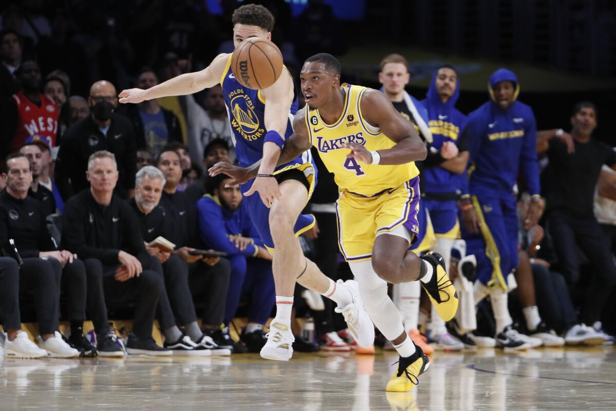 Lakers guard Lonnie Walker IV steals the ball from Warriors guard Klay Thompson during Game 4.