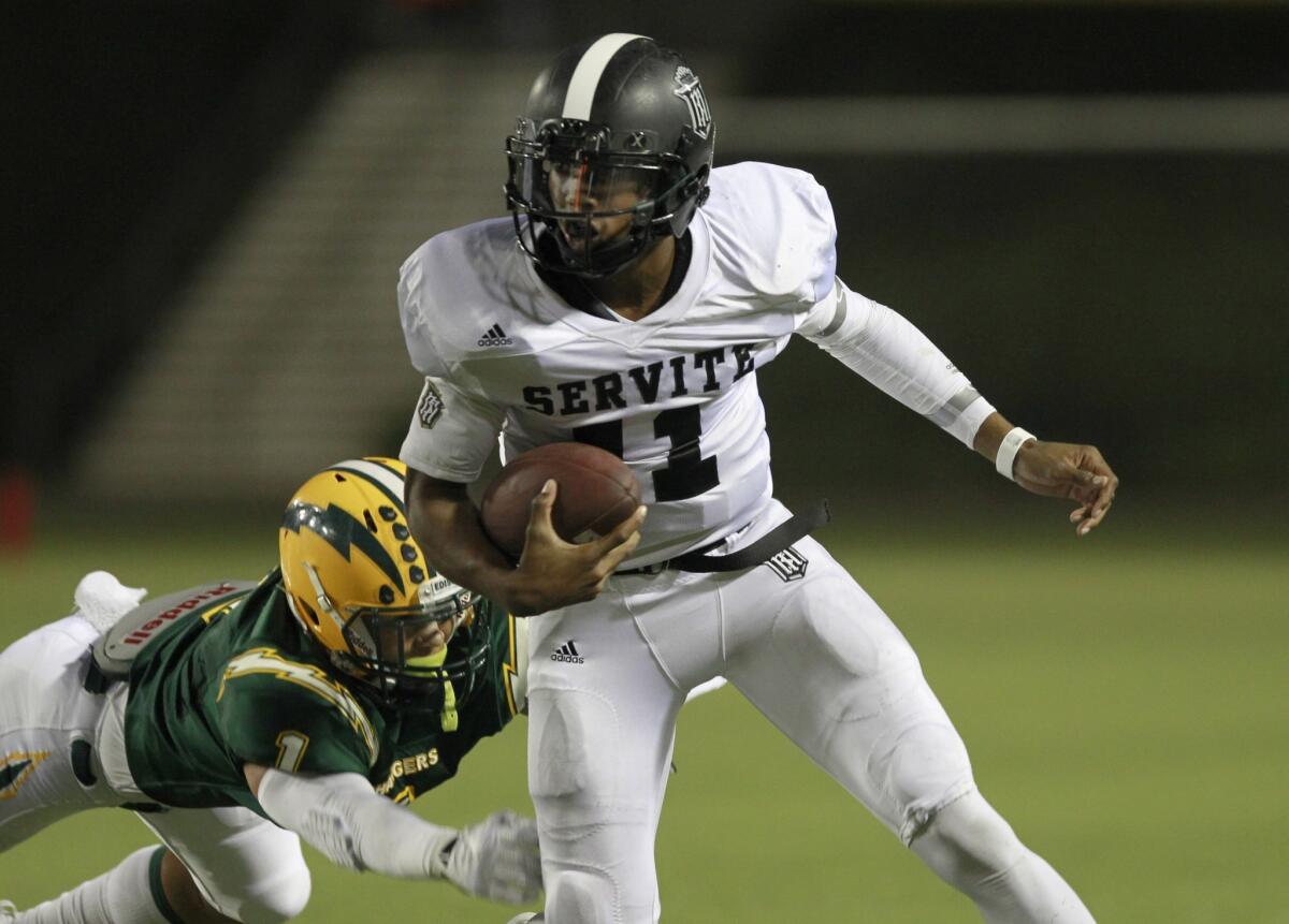 Quarterback Travis Waller will look to lead Servite to a playoff victory over a tough Westlake squad on Friday.
