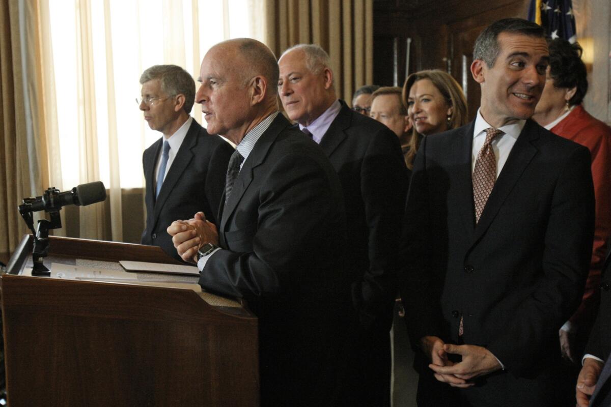 Gov. Jerry Brown and Mayor Eric Garcetti, seen here in February, have different attitudes about visiting the nation's capital.