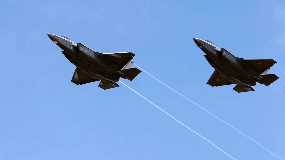 Two F-35A Joint Strike Fighters arrive at Williamtown air base outside of Newcastle, Australia.