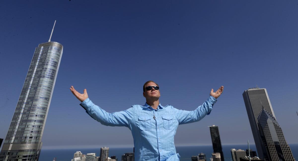 Nik Wallenda poses for a photo on the roof of the Leo Burnett Building in Chicago on Sept. 17.