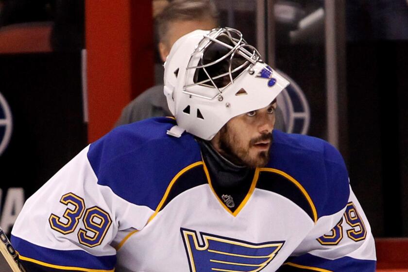 St Louis Blues goaltender Ryan Miller looks on during the pregame skate before an NHL hockey game against the Phoenix Coyotes, Sunday, March. 2, 2014, in Glendale, Ariz. Miller is making his debut with the Blues after being traded from the Buffalo Sabres. (AP Photo/Ralph Freso) ** Usable by LA and DC Only **