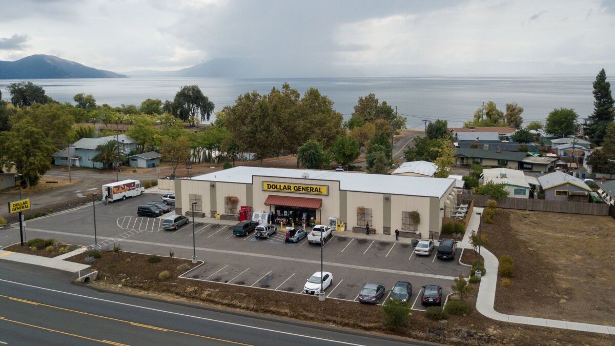 A Dollar General store is seen from above in Nice, Calif. “They are not waiting to see where a city is expanding,” said Alexander Lowry, professor of finance at Gordon College in Wenham, Mass. “They are looking for contractions."
