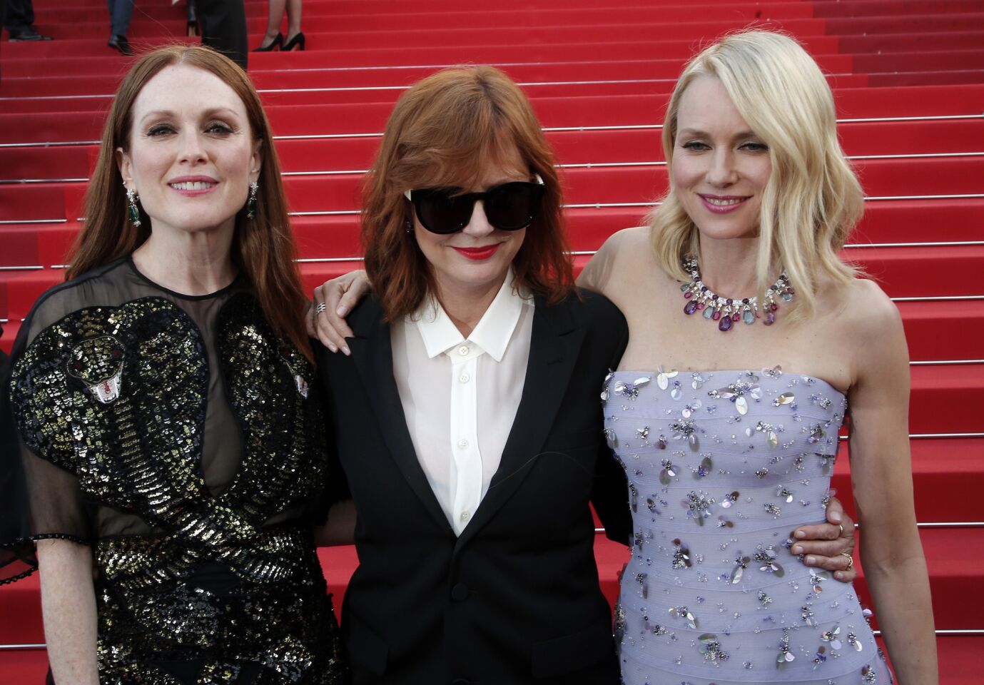 From left, actresses Julianne Moore, Susan Sarandon and Naomi Watts pose for photographers at the Cannes Film Festival screening of Woody Allen's "Cafe Society" on Wednesday.