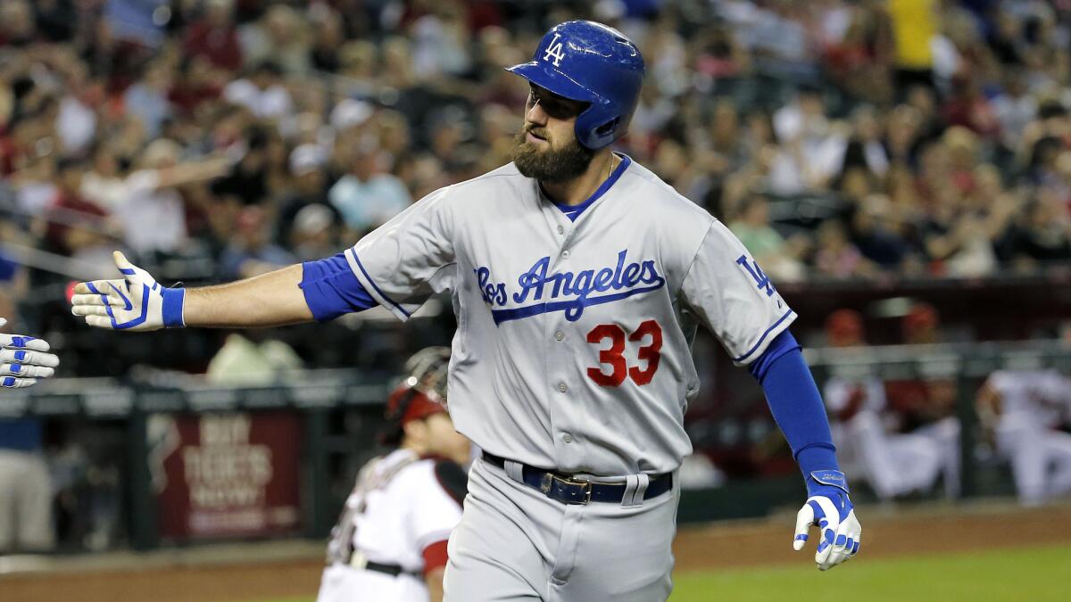 Dodgers outfielder Scott Van Slyke celebrates after hitting a solo home run against the Arizona Diamondbacks on May 16. Van Slyke will start in center field against the Chicago White Sox on Monday.