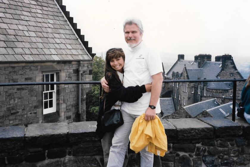 Jo Stougaard hugs her father in Edinburgh in 1986.