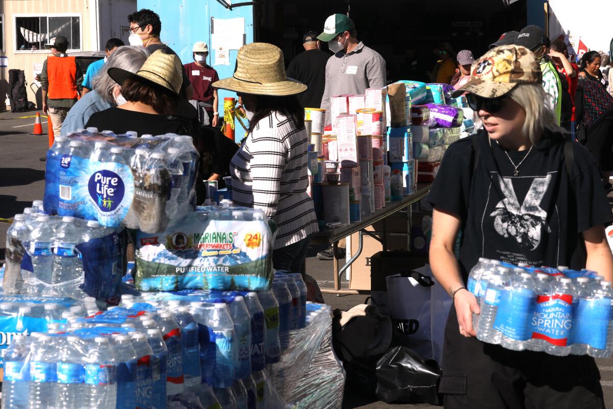 Volunteers distribute food, water, clothing, toiletries and other items to victims of the Eaton fire.