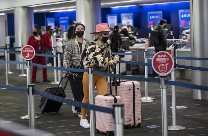 Travelers at LAX days before Thanksgiving