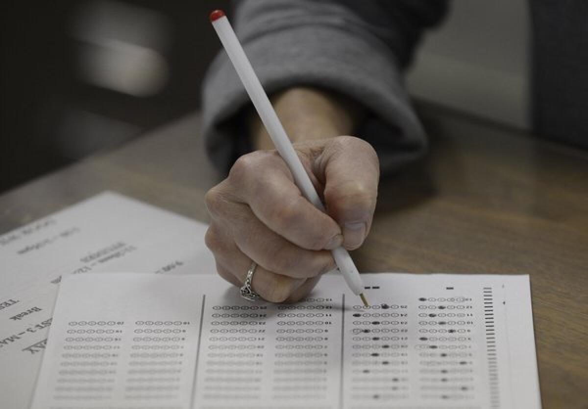 Officials say students from 16 California schools posted standardized test-related images on social-networking sites that could be deemed cheating violations.