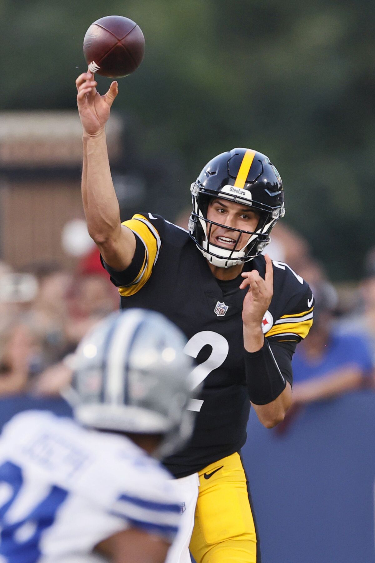 Pittsburgh Steelers quarterback Mason Rudolph throws a pass during the first half of the team's Pro Football Hall of Fame NFL preseason game against the Dallas Cowboys, Thursday, Aug. 5, 2021, in Canton, Ohio. (AP Photo/Ron Schwane)