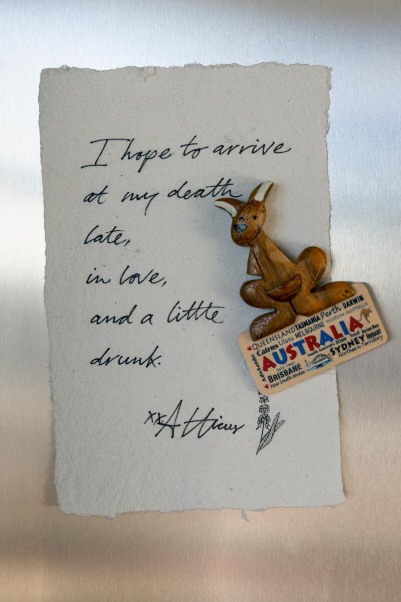An Aussie magnet holds up a poem by anonymous poet Atticus at Casey Boonstra's home.