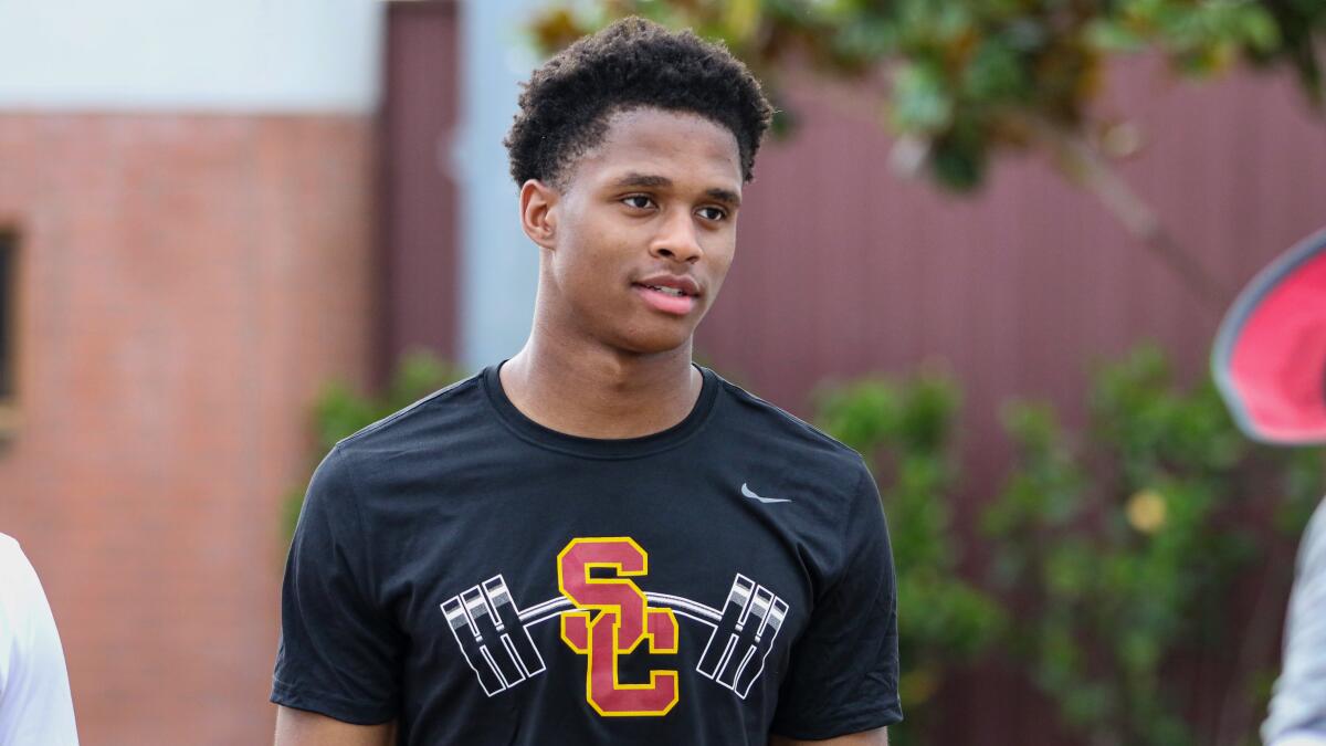 USC's Munir McClain looks on after a summer workout at Howard Jones Field.