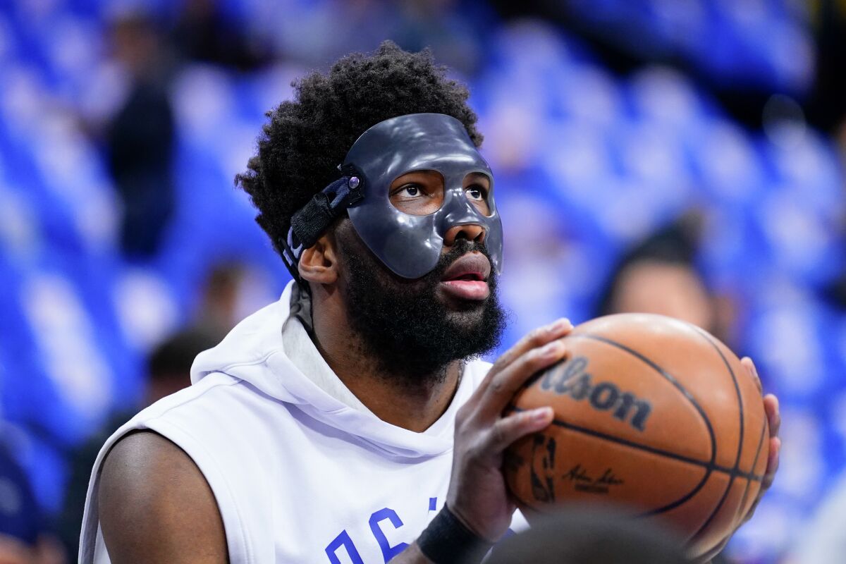 Philadelphia 76ers' Joel Embiid warms up before Game 3 of an NBA basketball second-round playoff series against the Miami Heat, Friday, May 6, 2022, in Philadelphia. (AP Photo/Matt Slocum)