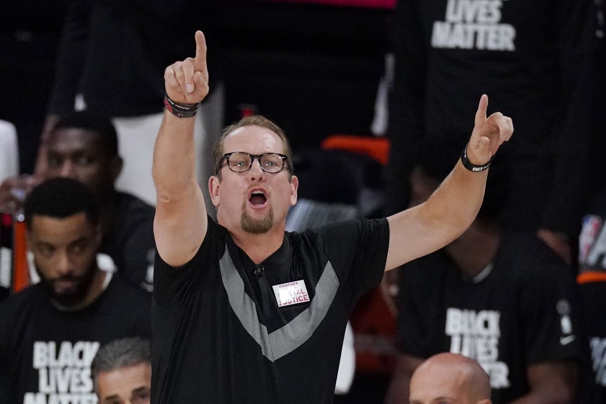 Toronto Raptors' head coach Nick Nurse directs his team during the first half of an NBA conference semifinal playoff basketball game with the Boston Celtics Monday, Sept. 7, 2020, in Lake Buena Vista, Fla. (AP Photo/Mark J. Terrill)