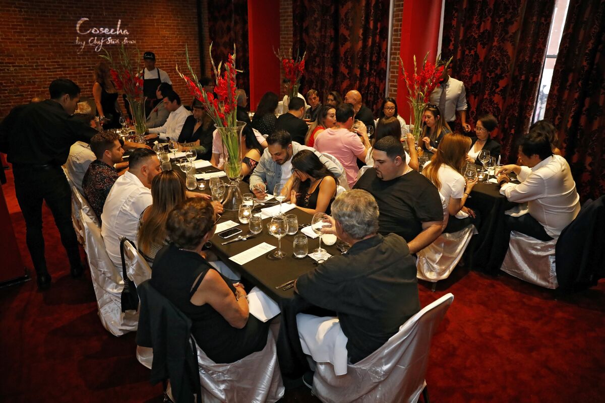 A photo of guests sitting down to eat at Cosecha SD