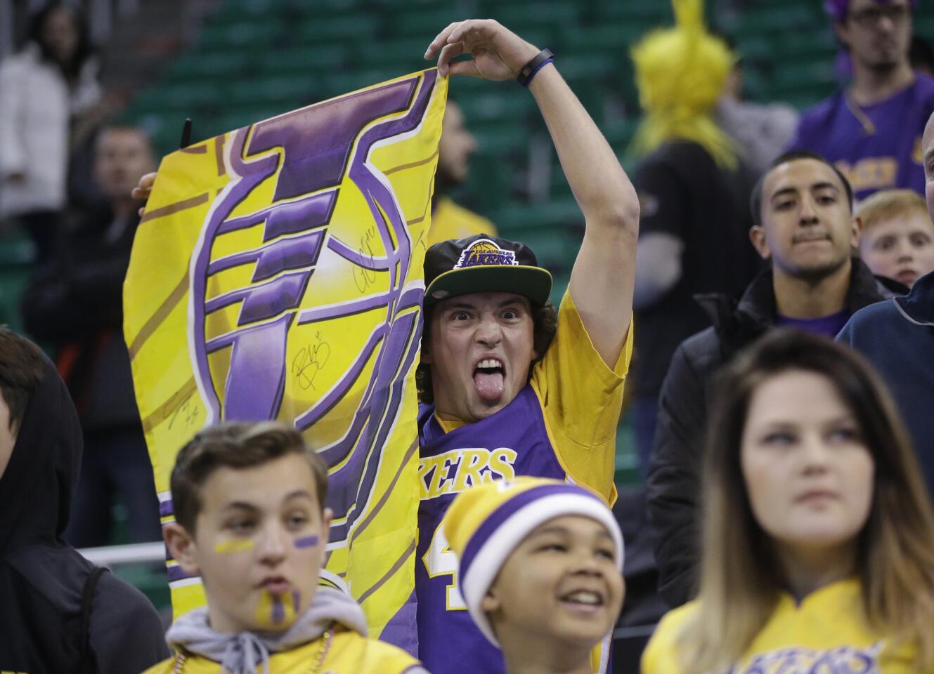 An excited Lakers fan shows his support and his tongue before the start of the game at Utah.