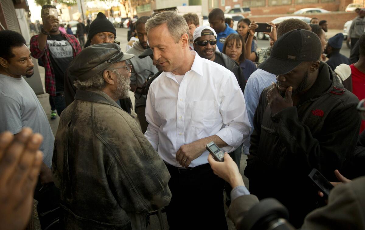 Former Maryland Gov. Martin O'Malley meets with residents n Baltimore on April 28.