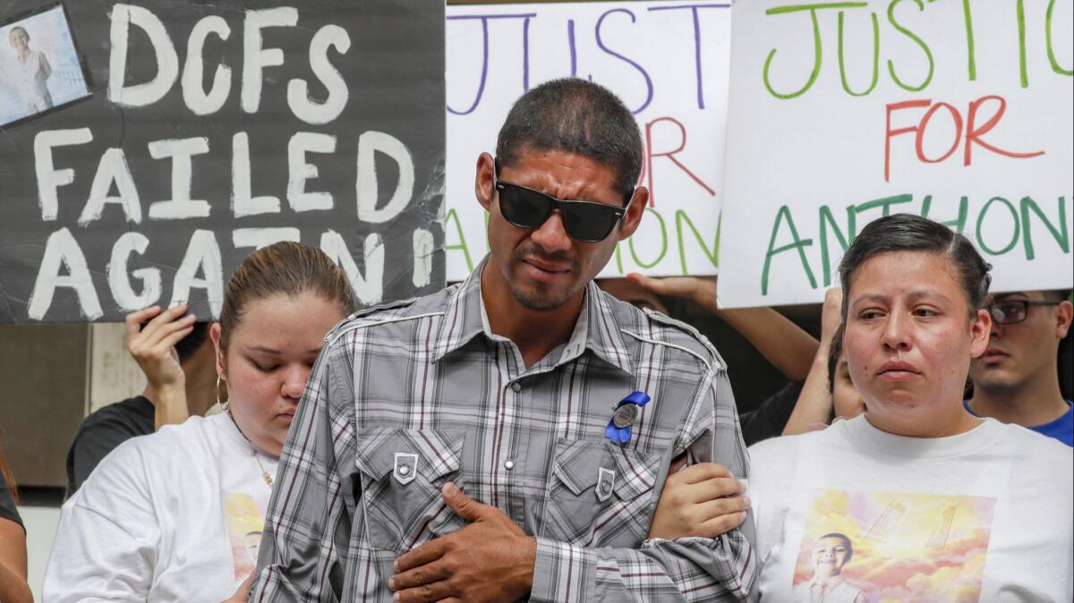 Victor Avalos, center, father of Anthony Avalos, called for a criminal investigation into social workers in connection with the 10-year-old's death.