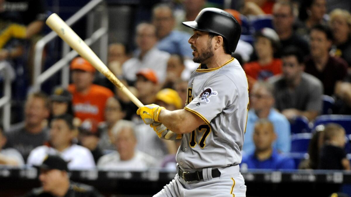 Pirates outfielder Matt Joyce watches his RBI single during the seventh inning of a game against the Marlins on June 1.