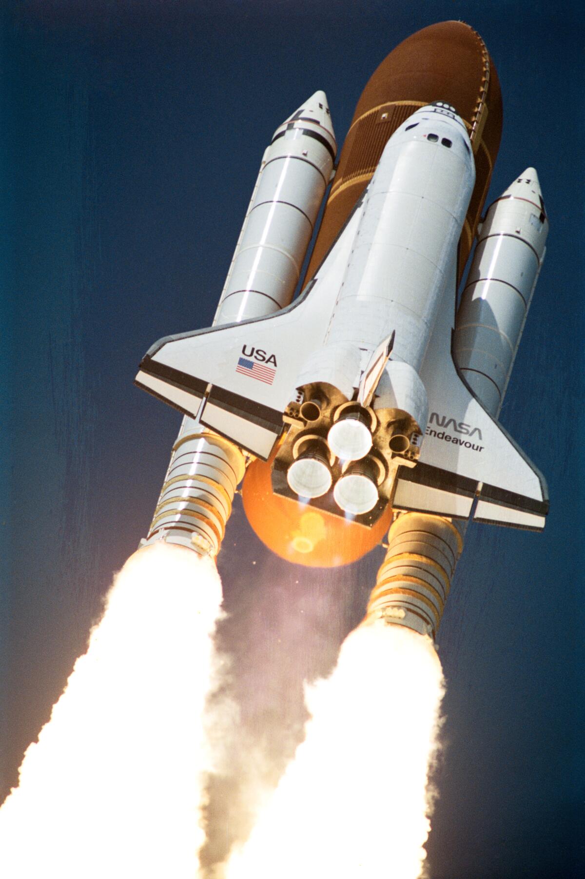A space shuttle heads into space