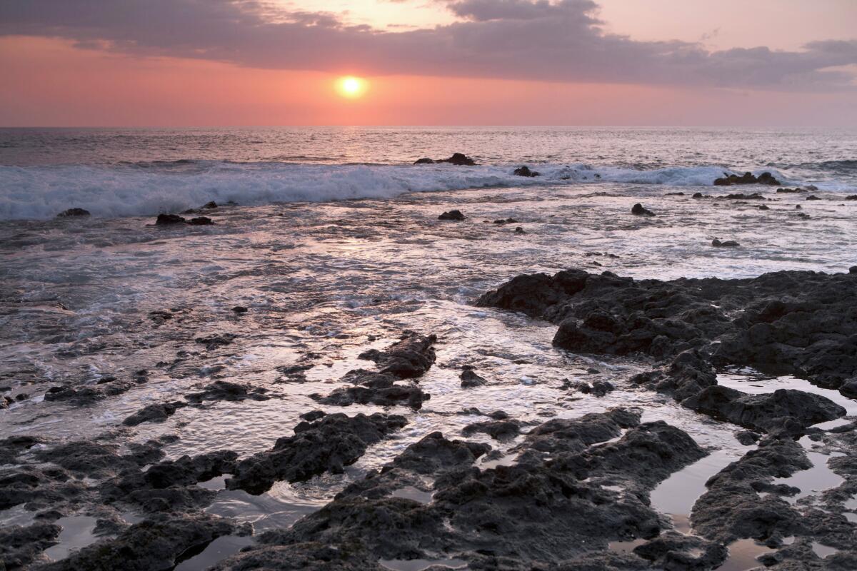 The sun sets at Pahoehoe Beach Park in Kona on the Big Island.
