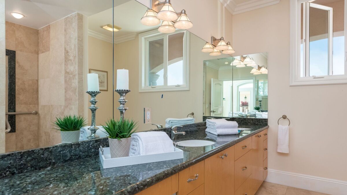 Clean, uncluttered, well-appointed master bathrooms increase a home's appeal.