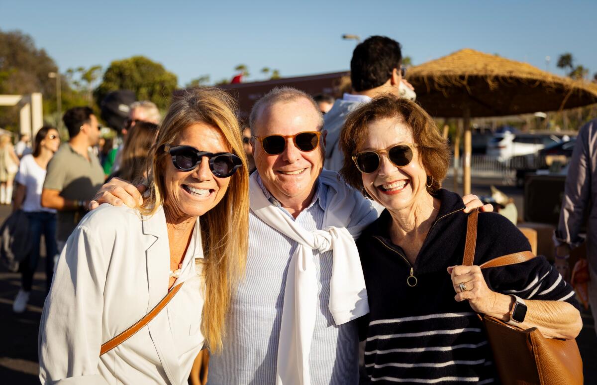 Carolyn McKitterick, Dwight and Kathie Armstrong enjoying the evening at Hoag Summer Fest benefiting Hoag Hospital.