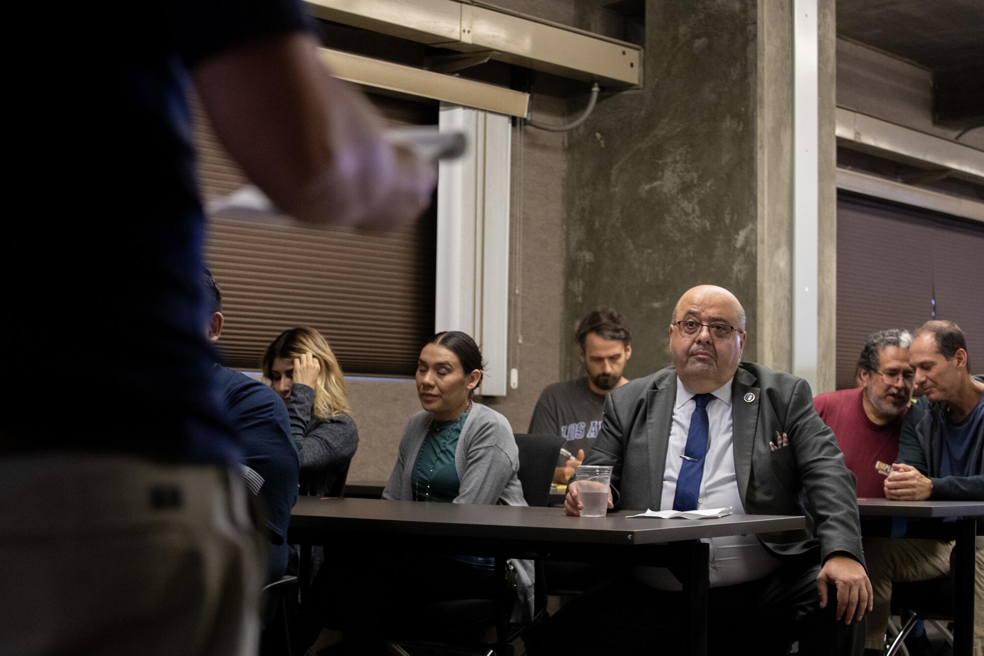 Adel Hagekhalil listens during a meeting at the Diemer Water Treatment Plant.