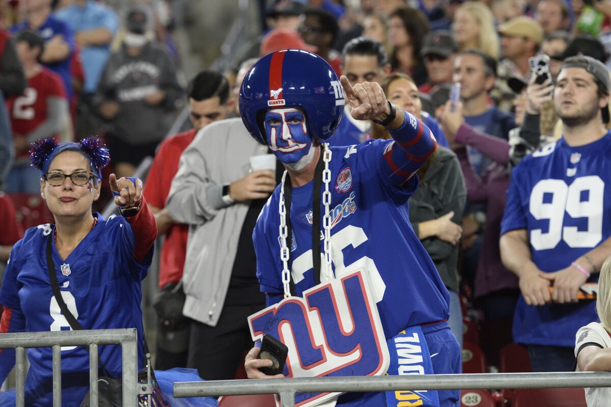New York Giants fans cheer on the team during a game against the Tampa Bay Buccaneers in November.