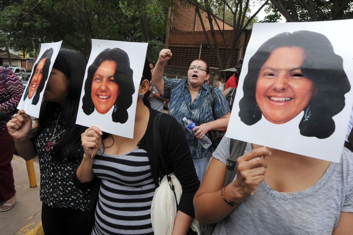 Activists protest the killing of Honduras environmental and indigenous rights leader Berta Caceres on Thursday.