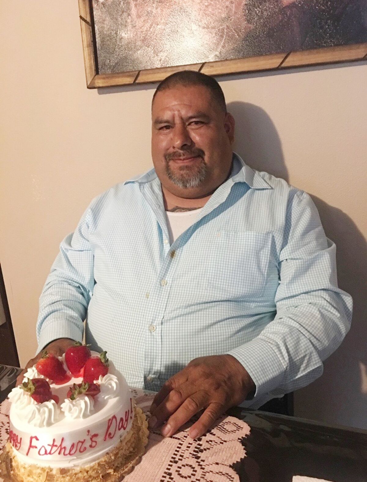 Gaspár Gómez with a Father's Day cake
