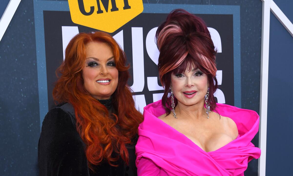 Wynonna Judd and Naomi Judd arrive at the CMT Music Awards.