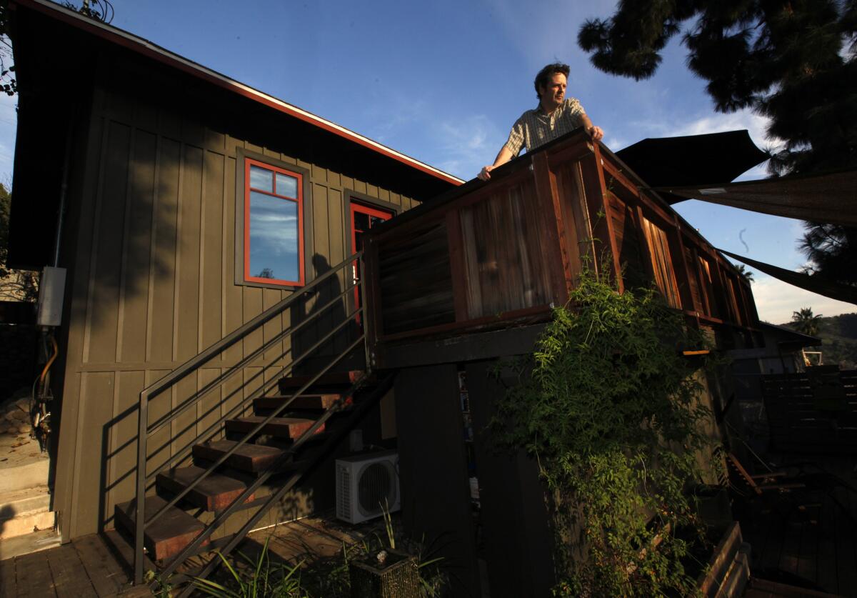 Todd Segal on the back deck of his 624-square-foot home in Highland Park. The contractor took the house down to the studs and rebuilt everything, including the deck. "I wanted to live on a mountain," he says. "It doesn't feel like L.A. to me."