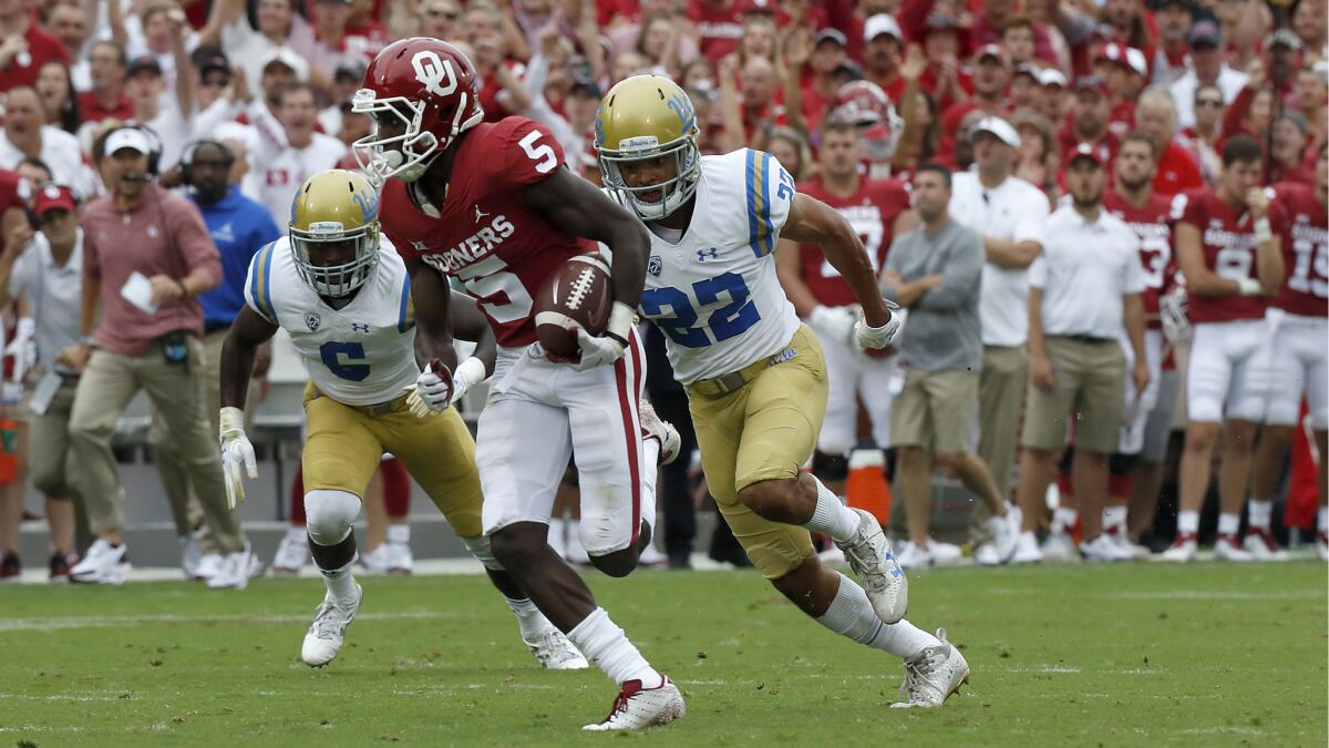 Oklahoma receiver Marquise Brown breaks away for a touchdown catch and run against UCLA in the first quarter.