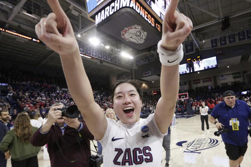 Gonzaga guard Kaylynne Truong celebrates the team's win against Utah in a second-round college basketball game in the NCAA Tournament in Spokane, Wash., Monday, March 25, 2024. (AP Photo/Young Kwak)